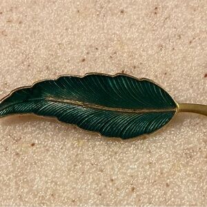 Green and Gold Feather Brooch with Intricate Detailing